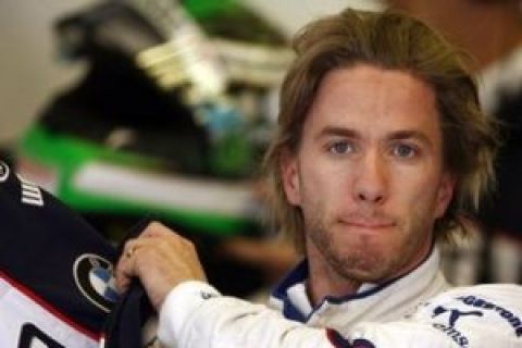 BMW Sauber driver Nick Heidfeld of Germany reacts at the end of the third free practice ahead of the Belgian Formula One Grand Prix in Spa-Francorchamps circuit, Belgium, Saturday, Aug. 29, 2009. He clocked the best time. (AP Photo/Luca Bruno)