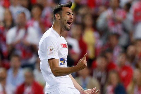 Sevillas Vicente Iborra reacts during the final of the Copa del Rey soccer match between FC Barcelona and Sevilla FC at the Vicente Calderon stadium in Madrid, Sunday, May 22, 2016. (AP Photo/Daniel Ochoa de Olza)