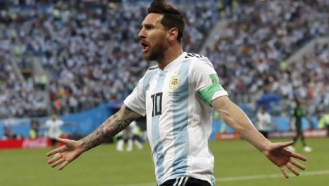 Argentina's Lionel Messi celebrates after scoring the opening goal of his team during the group D match between Argentina and Nigeria, at the 2018 soccer World Cup in the St. Petersburg Stadium in St. Petersburg, Russia, Tuesday, June 26, 2018. (AP Photo/Petr David Josek)