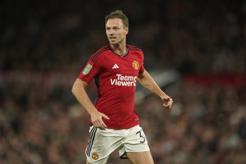 Manchester United's Jonny Evans runs during the English League Cup third round soccer match between Manchester United and Crystal Palace at Old Trafford stadium in Manchester, England, Tuesday, Sept. 26, 2023. (AP Photo/Dave Thompson)