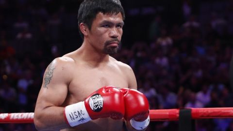 Manny Pacquiao prepares to fight Keith Thurman in a welterweight title fight Saturday, July 20, 2019, in Las Vegas. (AP Photo/John Locher)