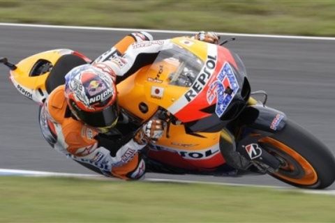 Australia's Casey Stoner takes a corner during a practice session for the MotoGP Grand Prix of Japan at the Twin Ring Motegi circuit in Motegi, north of Tokyo, Saturday, Oct. 1, 2011. (AP Photo/Greg Baker)