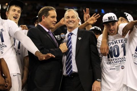 HOUSTON, TX - APRIL 04:  Head coach Jim Calhoun of the Connecticut Huskies is interviewed by Jim Nantz after defeating the Butler Bulldogs to win the National Championship Game of the 2011 NCAA Division I Men's Basketball Tournament by a score of 53-41 at Reliant Stadium on April 4, 2011 in Houston, Texas.  (Photo by Streeter Lecka/Getty Images)