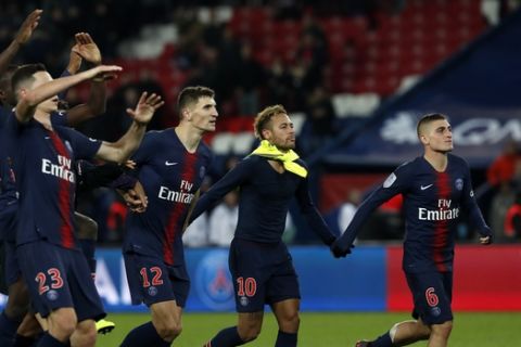 PSG's player salute their fans after winning the League One soccer match between Paris Saint-Germain and Lille 2-1 at the Parc des Princes stadium in Paris, Friday, Nov. 2, 2018. (AP Photo/Thibault Camus)