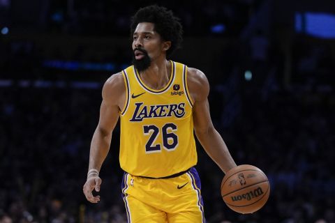 Los Angeles Lakers guard Spencer Dinwiddie dribbles during the second half of an NBA basketball game against the Detroit Pistons, Tuesday, Feb. 13, 2024, in Los Angeles. (AP Photo/Ryan Sun)