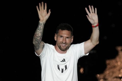 Inter Miami's Lionel Messi waves to fans as he is introduced during a celebration by the team at DRV PNK Stadium, Sunday, July 16, 2023, in Fort Lauderdale, Fla. (AP Photo/Rebecca Blackwell)