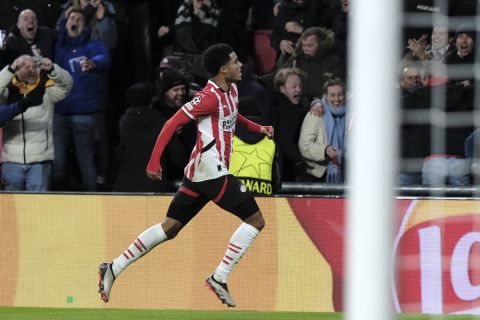 PSV's Malik Tillman celebrates after scoring his sides first goal during the Champions League opening phase soccer match between PSV Eindhoven and Shakhtar Donetsk at the PSV Stadium in Eindhoven, Netherlands, Wednesday, Nov. 27, 2024. (AP Photo/Patrick Post)