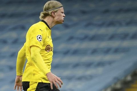 Dortmund's Erling Haaland is dejected after missing an opportunity to score during the Champions League, first leg, quarterfinal soccer match between Manchester City and Borussia Dortmund at the Etihad stadium in Manchester, Tuesday, April 6, 2021. (AP Photo/Dave Thompson)