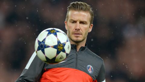 Paris Saint-Germain's English midfielder David Beckham juggles during a warm up session prior to the UEFA Champions League round of 16 second leg football match Paris Saint-Germain vs Valencia, on March 6, 2013 at the Parc-des-Princes stadium in Paris.   AFP PHOTO / FRANCK FIFE        (Photo credit should read FRANCK FIFE/AFP/Getty Images)