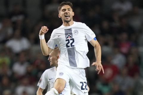 Slovenia's Adam Gnezda Cerin celebrates after scoring his side's opening goal during the UEFA Nations League soccer match between Slovenia and Serbia at Stozice stadium in Ljubljana, Slovenia, Sunday, June 12, 2022. (AP Photo/Darko Bandic)