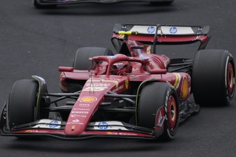 Carlos Sainz, of Spain, steers his Ferrari during the Formula One Mexico Grand Prix auto race at the Hermanos Rodriguez racetrack in Mexico City, Sunday, Oct. 27, 2024. (AP Photo/Eduardo Verdugo)