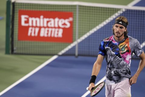 Stefanos Tsitsipas, of Greece, plays during the Western & Southern Open tennis tournament Saturday, Aug. 20, 2022, in Mason, Ohio. (AP Photo/Jeff Dean)