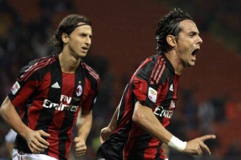 AC Milan's Filippo Inzaghi celebrates after scoring against Catania during their Italian Serie A soccer match at the San Siro stadium in Milan September 18, 2010.  REUTERS/Alessandro Garofalo (ITALY SPORT - Tags: SPORT SOCCER)