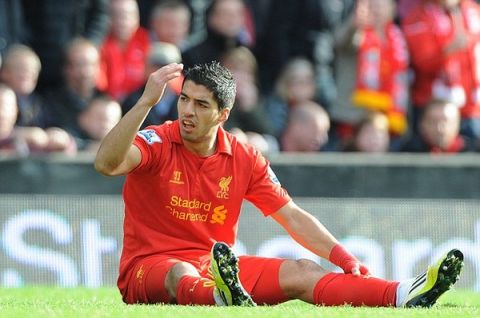 Photograph By Peter Powell.  7-10-2012.

Liverpool v Stoke City

Suarez is brought down yet again.