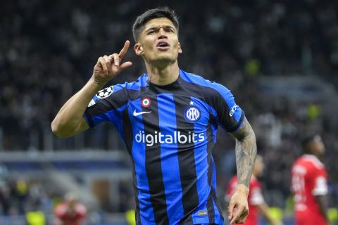 Inter Milan's Joaquin Correa celebrates after scoring his side's third goal during the Champions League quarterfinal second leg soccer match between Inter Milan and Benfica at the San Siro stadium in Milan, Italy, Wednesday, April 19, 2023. (AP Photo/Luca Bruno)