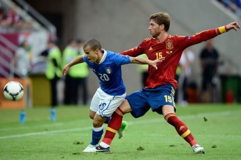 GDANSK, POLAND - JUNE 10:  Sebastian Giovinco of Italy and Sergio Ramos of Spain during the UEFA EURO 2012 group C match between Spain and Italy at The Municipal Stadium on June 10, 2012 in Gdansk, Poland.  (Photo by Claudio Villa/Getty Images)