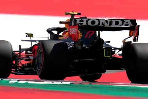 Red Bull driver Sergio Perez of Mexico steers his car during the qualifying session for the Austrian Formula One Grand Prix at the Red Bull Ring racetrack in Spielberg, Austria, Saturday, July 3, 2021. The Austrian Grand Prix will be held on Sunday. (AP Photo/Darko Bandic)