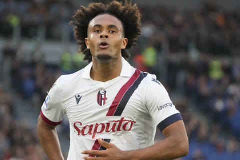 Bologna's Joshua Zirkzee celebrates after scoring the second goal against Roma during the Italian Serie A soccer match between Roma and Bologna at Rome's Olympic Stadium, Monday, April 22, 2024. (AP Photo/Gregorio Borgia)