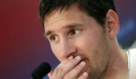 FC Barcelona's player Lionel Messi attends a news conference at Joan Gamper training Camp, near Barcelona July 18, 2012. REUTERS/stringer (SPAIN - Tags: SPORT SOCCER)