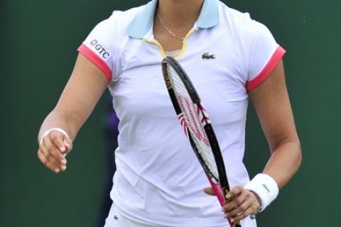 German player Eleni Daniilidou reacts as she plays with Serbian player Ana Ivanovic during the women's single at the Wimbledon Tennis Championships at the All England Tennis Club, in southwest London on June 23, 2011. AFP PHOTO / GLYN KIRK
RESTRICTED TO EDITORIAL USE (Photo credit should read GLYN KIRK/AFP/Getty Images)