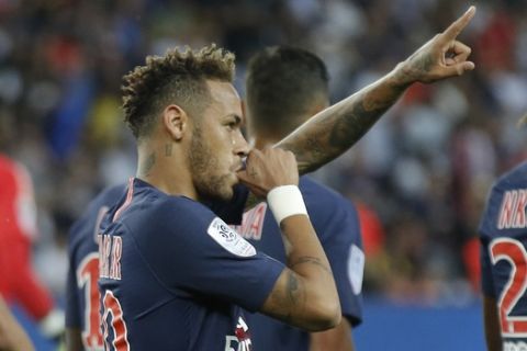 PSG's Neymar celebrates the opening goal during their League One soccer match between Paris Saint-Germain and Caen at Parc des Princes stadium in Paris, Sunday, Aug. 12, 2018. (AP Photo/Michel Euler)