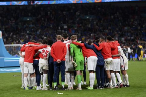 English players react after the Euro 2020 soccer final match between England and Italy at Wembley stadium in London, Sunday, July 11, 2021. (Laurence Griffiths/Pool via AP)