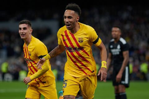 220321 -- MADRID, March 21, 2022 -- Barcelona s Pierre-Emerick Aubameyang C celebrates his goal during a La Liga match between Real Madrid and FC Barcelona, Barca in Madrid, Spain, March 20, 2022. Photo by /Xinhua SPSPAIN-MADRID-FOOTBALL-SPANISH LEAGUE-REAL MADRID VS BARCELONA PabloxMorano PUBLICATIONxNOTxINxCHN 