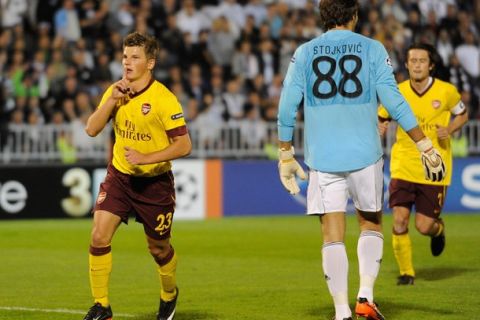 BELGRADE, SERBIA - SEPTEMBER 28:  Andrey Arshavin of Arsenal celebrates scoring his team's first goal during the UEFA Champions League Group H match between FK Partizan and Arsenal at the Partizan Stadium on September 28, 2010 in Belgrade, Serbia.  (Photo by Michael Regan/Getty Images)