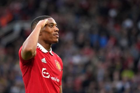 Manchester United's Anthony Martial celebrates after scoring his side's second goal during the English Premier League soccer match between Manchester United and Chelsea at the Old Trafford stadium in Manchester, England, Thursday, May 25, 2023. (AP Photo/Dave Thompson)