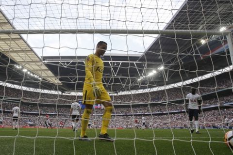 Tottenham Hotspur's goalkeeper Michel Vorm walks towards the ball in the back of the net after Manchester United's Alexis Sanchez scored his sides 1st goalduring the English FA Cup semifinal soccer match between Manchester United and Tottenham Hotspur at Wembley stadium in London, Saturday, April 21, 2018. (AP Photo/Frank Augstein)