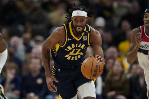 Indiana Pacers' Isaiah Jackson dribbles during the first half of an NBA basketball game against the Washington Wizards, Wednesday, Jan. 10, 2024, in Indianapolis. (AP Photo/Darron Cummings)