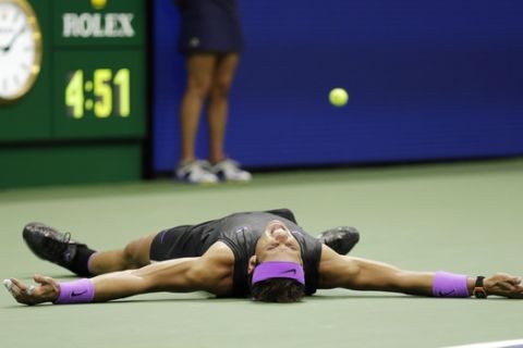 Rafael Nadal, of Spain, reacts after defeating Daniil Medvedev, of Russia, to win the men's singles final of the U.S. Open tennis championships Sunday, Sept. 8, 2019, in New York. (AP Photo/Adam Hunger)