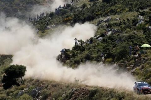 French World Champion Sebastien Loeb and his co-driver Daniel Elena drive with their Citroen DS3 during the Klenia-Mycenea stage of the WRC Acropolis Rally of Greece, near Korinth, Greece, Saturday, June 18, 2011. (AP Photo/Petros Giannakouris)