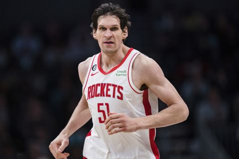 Houston Rockets center Boban Marjanovic (51) plays against the Charlotte Hornets during the first half of an NBA basketball game in Charlotte, N.C., Friday, April 7, 2023. (AP Photo/Jacob Kupferman)