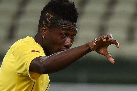 Ghana's forward Asamoah Gyan takes part in a training session in the Castelao Stadium in Fortaleza on June 20, 2014 on the eve of the Group G football match between Germany  and Ghana in the 2014 FIFA World Cup in Brazil. AFP PHOTO / PATRIK STOLLARZ FBL-WC-2014-GHA-TRAINING