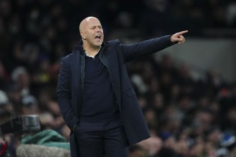 Liverpool's manager Arne Slot reacts during the English Premier League soccer match between Tottenham and Liverpool at Tottenham Hotspur Stadium in London, Sunday, Dec. 22, 2024. (AP Photo/Dave Shopland)