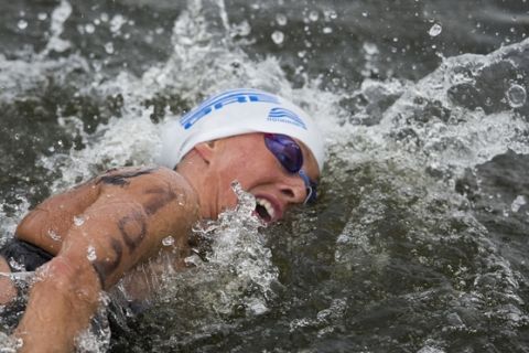 Sixth placed Greece's Kalliopi Araouzou competes in the women's 5km open water swim competition at the LEN Swimming European Championships in Berlin, Germany, Thursday, Aug. 14, 2014. (AP Photo/Gero Breloer)