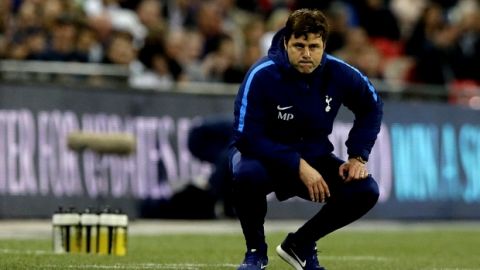 Tottenham Hotspur's manager Mauricio Pochettino watches his team during the English Premier League soccer match between Tottenham Hotspur and Newcastle United at Wembley Stadium, in London, England, Wednesday, May 9, 2018. (AP Photo/Alastair Grant)