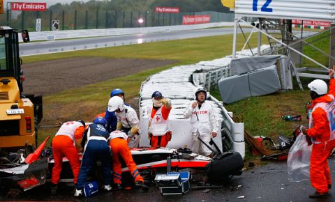 SUZUKA, JAPAN - OCTOBER 05:  Jules Bianchi of France and Marussia receives urgent medical treatment after crashing during the Japanese Formula One Grand Prix at Suzuka Circuit on October 5, 2014 in Suzuka, Japan.  (Photo by Getty Images/Getty Images)