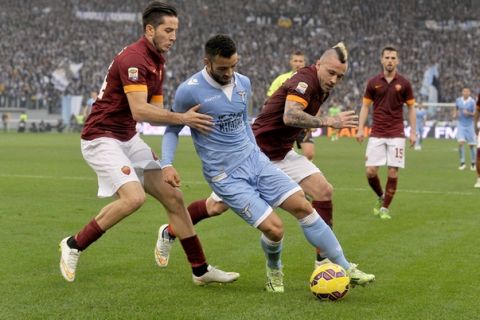 ROMA LAZIO  2014/2015
All'Olimpico ore 15,00 la ROMA  di Rudi Garciala incontra la LAZIO di Stefano PIOPLI  nel tradizionale DERBY CAPITOLINO diciottesima giornata del Campionato di Serie "A"  2014/2015
ANDERSON CONTRO NAINGGOLAN E MANOLAS
(fotoTedeschi)