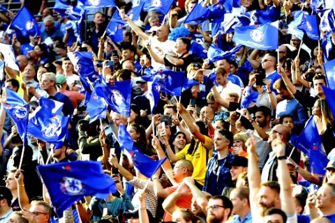 Chelsea fans celebrate after winning the English FA Cup final soccer match between Chelsea v Manchester United at Wembley stadium in London, England, Saturday, May 19, 2018. (AP Photo/Rui Vieira)