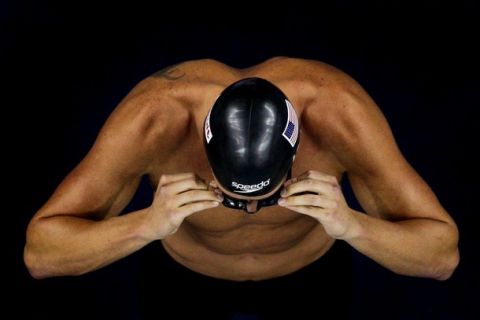 SHANGHAI, CHINA - JULY 29:  Ryan Lochte of the United States adjusts his goggles before the Men's 200m Backstroke Final during Day Fourteen of the 14th FINA World Championships at the Oriental Sports Center on July 29, 2011 in Shanghai, China.  (Photo by Feng Li/Getty Images)