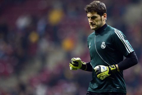 Real Madrid's goalkeeper and captain Iker Casillas takes part in the warm up before the start of the UEFA Champions League quarter-final second leg football match Galatasaray vs Real Madrid on April 9, 2013 at Ali Sami Yen stadium in Istanbul.  AFP PHOTO / JAVIER SORIANO        (Photo credit should read JAVIER SORIANO/AFP/Getty Images)