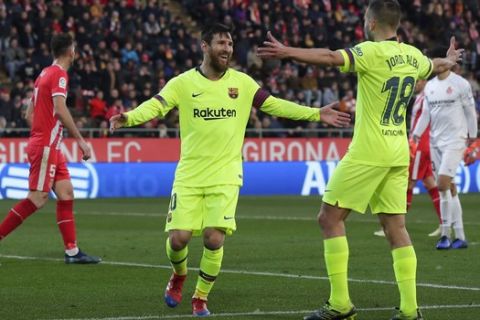 FC Barcelona's Lionel Messi celebrates after scoring his side's second goal during the Spanish La Liga soccer match between Girona and FC Barcelona at the Montilivi stadium in Girona, Spain, Sunday, Jan. 27, 2019. (AP Photo/Manu Fernandez)