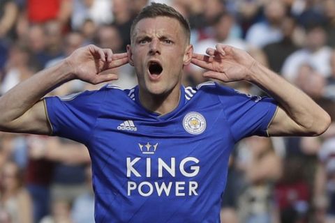 Leicester City's Jamie Vardy celebrates after scoring his sides 1st goal of the game during the English Premier League soccer match between West Ham and Leicester City at the London stadium in London, Saturday, April 20, 2019. (AP Photo/Kirsty Wigglesworth)