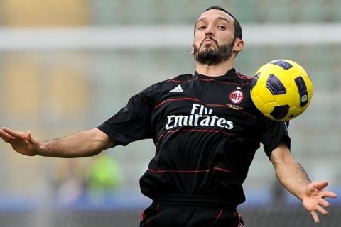 AC Milan's defender Gianluca Zambrotta controls the ball  during the Italian Serie A football match against Bari, on November 7, 2010 at Bari's stadium.  AC Milan won 3-2.  AFP PHOTO / ANDREAS SOLARO (Photo credit should read ANDREAS SOLARO/AFP/Getty Images)