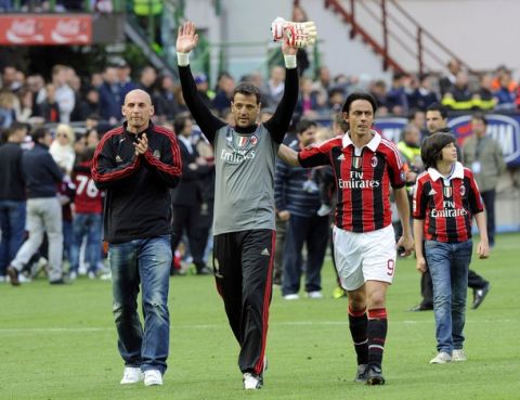 MILAN, ITALY - MAY 13:  Flavio Roma (C) of AC Milan salutes the fans after his last game for AC Milan after the Serie A match between AC Milan and Novara Calcio at Stadio Giuseppe Meazza on May 13, 2012 in Milan, Italy.  (Photo by Claudio Villa/Getty Images)