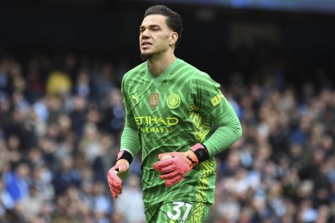 Manchester City's goalkeeper Ederson during the English Premier League soccer match between Manchester City and Luton Town at Etihad stadium in Manchester, England, Saturday, April 13, 2024. (AP Photo/Rui Vieira)