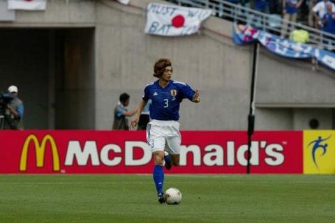 Football - 2002 FIFA World Cup Korea/Japan(tm) , Group H , Tunisia v Japan , Osaka Nagai Stadium , Osaka , Japan , 14/6/02
Japan's Naoki Matsuda
McDonald's board
Mandatory Credit:Action Images / Andrew Budd
Digital




