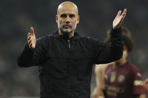 Manchester City's head coach Pep Guardiola reacts at the end of the English League Cup fourth round soccer match between Tottenham and Manchester City, at the Tottenham Hotspur Stadium in London, Wednesday, Oct 30, 2024. (AP Photo/Ian Walton)